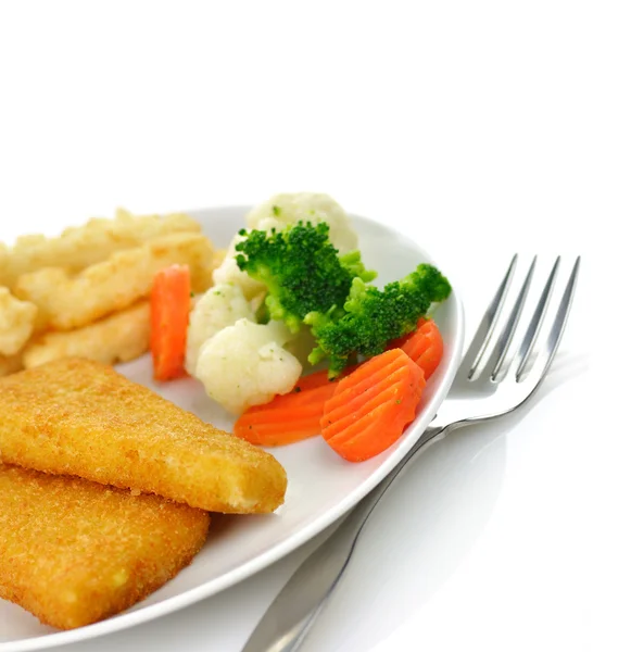 stock image Fish fillets with fried potato and vegetables