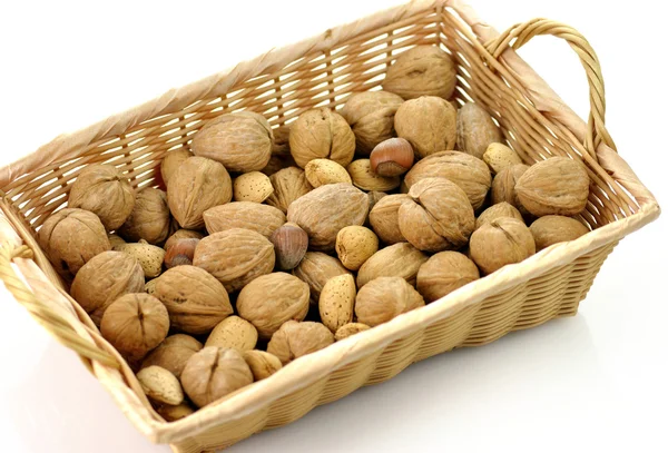 Mixed nuts in a basket — Stock Photo, Image