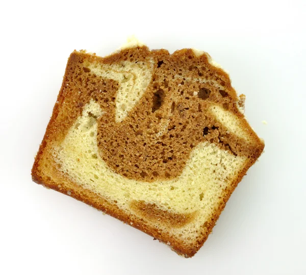 シナモンの渦巻のパンのケーキをスライス — ストック写真