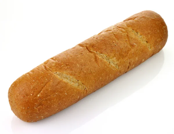 Whole wheat loaf of bread — Stock Photo, Image