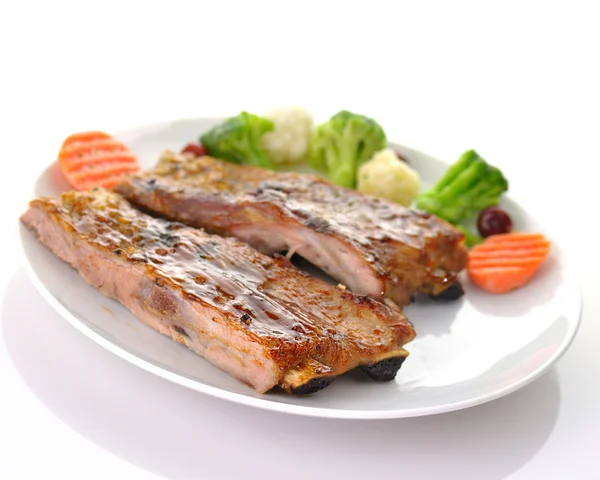 Varkensribbetjes met barbecue saus — Stockfoto