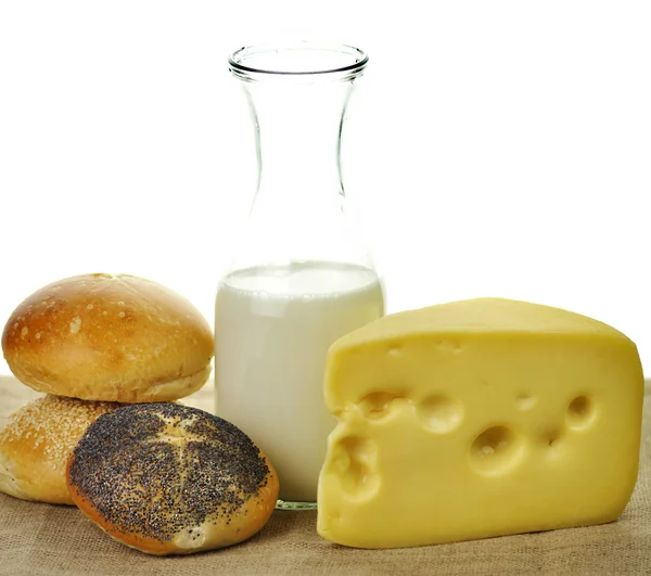 Botella de leche, queso y rollos frescos —  Fotos de Stock