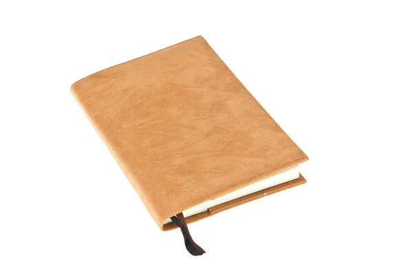 Beyaz arka plan üzerinde izole işareti ile bir kahverengi kadife kitap — Stok fotoğraf