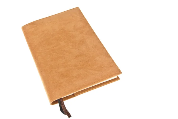 Beyaz arka plan üzerinde izole işareti ile bir kahverengi kadife kitap — Stok fotoğraf