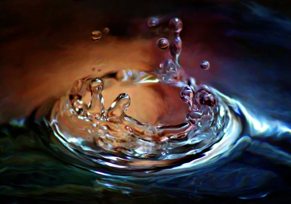 Plusk kropla wody kolorowy — Zdjęcie stockowe