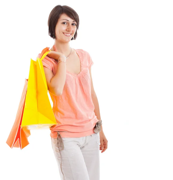 Menina carregando sacos de compras — Fotografia de Stock