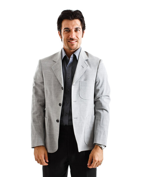 Portrait of a smiling businessman standing against a white background