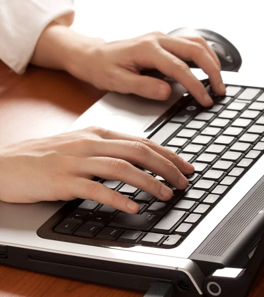 Stock image Hands typing on a laptop