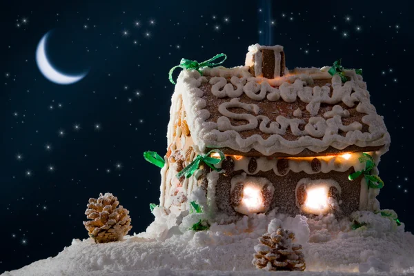 Gingerbread home at the night in winter — Stock Photo, Image