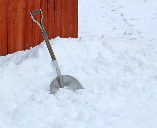Snow shovel and snow — Stock Photo, Image