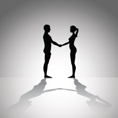 Erkek ve kadın el ele tutuşuyor
