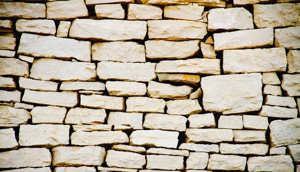 Witte stenen muur Stockfoto