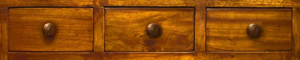 Drei Holzschubladen Stockbild