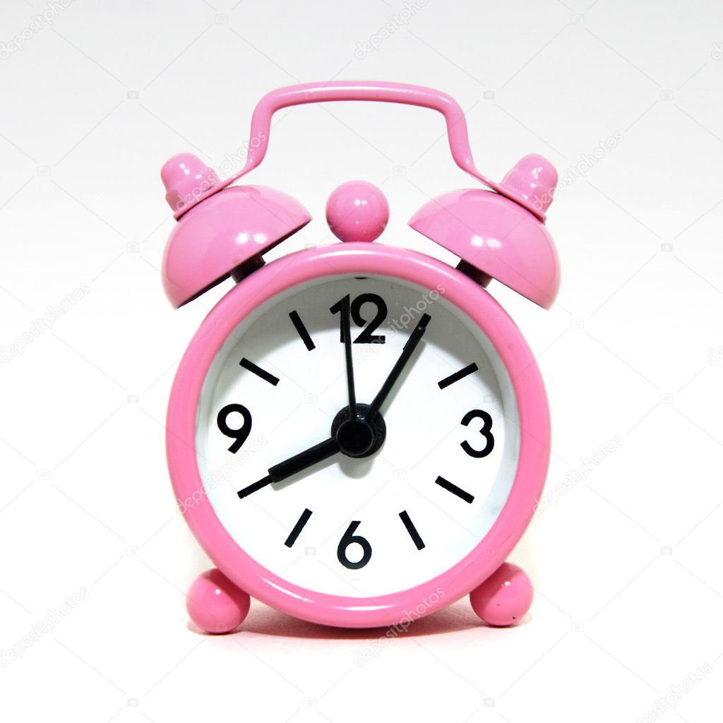 Old fashioned alarm clock on white background