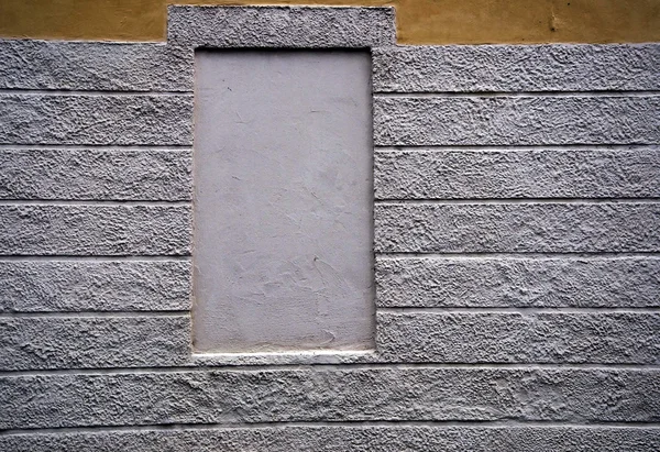A parede amarela e o quadrado cinzento — Fotografia de Stock