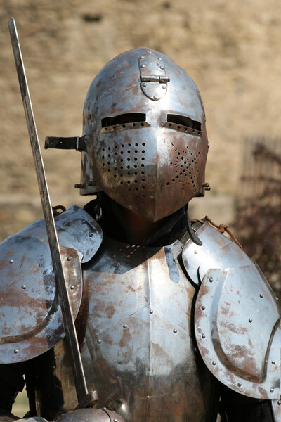 Medieval Knight dressed in armor and redy for battle.