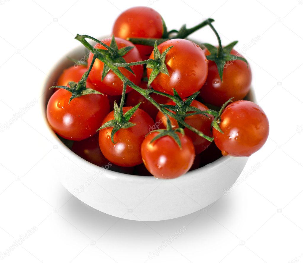 Tomatoes in white cup