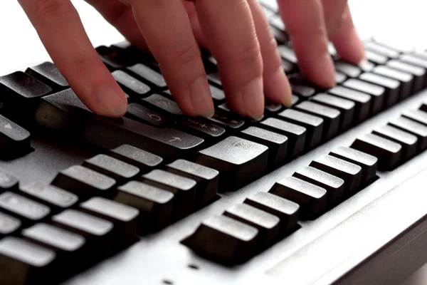 Typing fingers on a keyboard — Stock Photo, Image