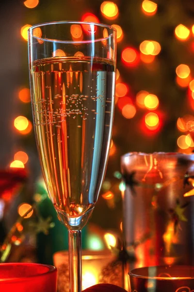 Champagne and lights on bakground. — Stock Photo, Image