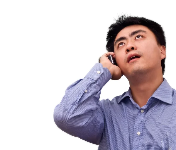 Business man looking up talking by phone — Stock Photo, Image