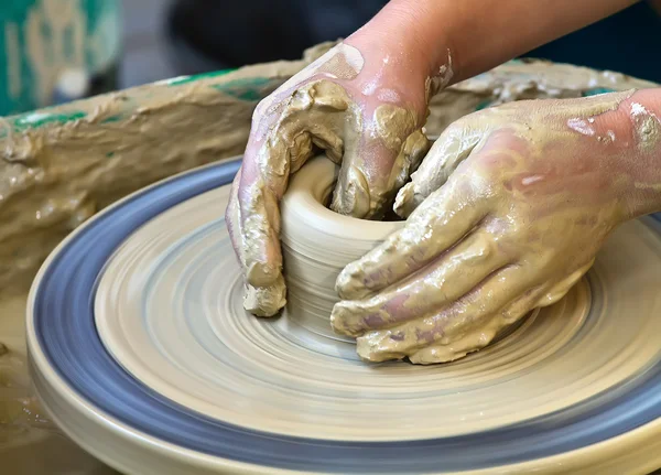 Hands working on pottery — Stock Photo, Image