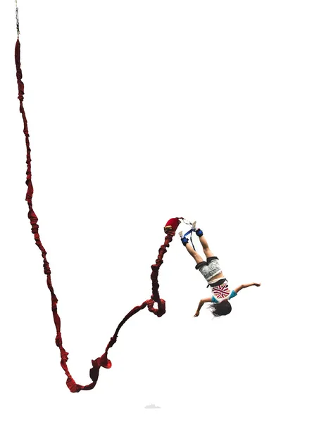 Ізоляційне фото дівчини, що стрибає з банджі — стокове фото