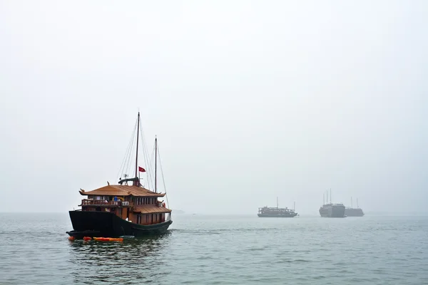 stock image Boats heading off to work in a cloudy day