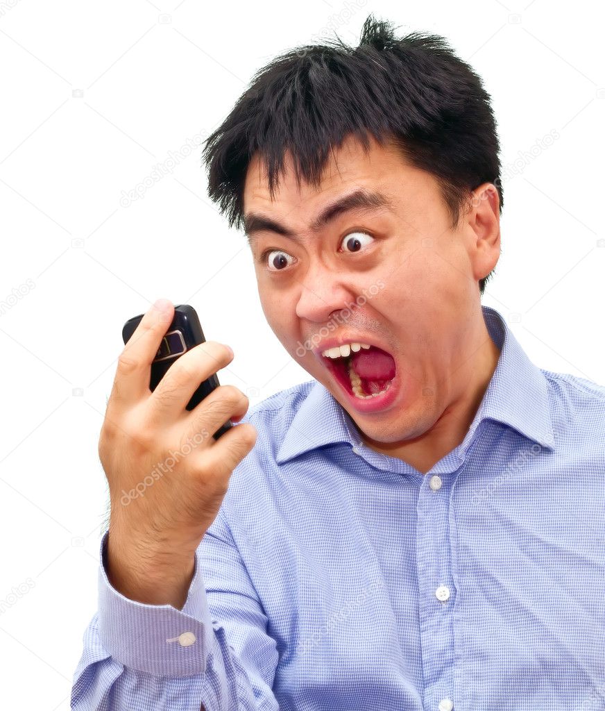 Crazy angry asian man yelling at phone