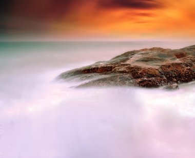 günbatımı deniz kaya