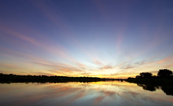 stock image Landscape of a lake at sunset