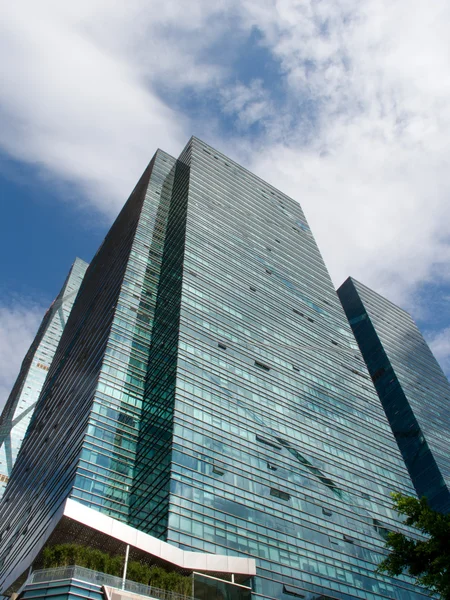 stock image Modern office building with blue sky