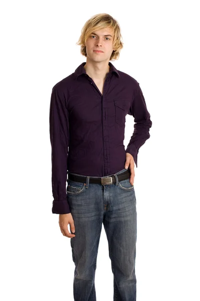 Młody człowiek w fioletowy koszula i jeansy. łapka na biały. — Zdjęcie stockowe