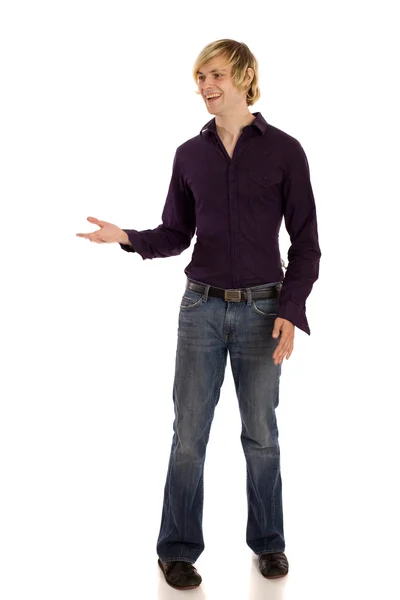 Young man in purple shirt and jeans. Studio shot over white. — Stock Photo, Image