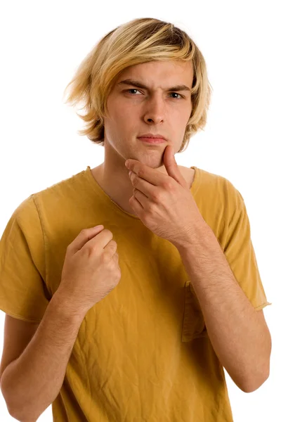 Zaniedbany, młody człowiek w żółte koszulki. łapka na biały. — Zdjęcie stockowe