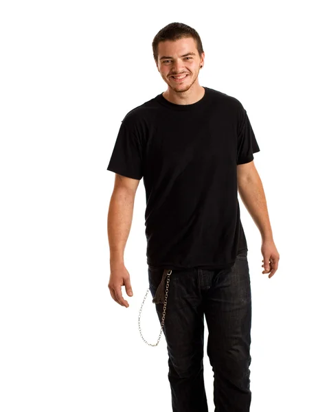Junger Mann zu Fuß. Studioaufnahme über Weiß. — Stockfoto
