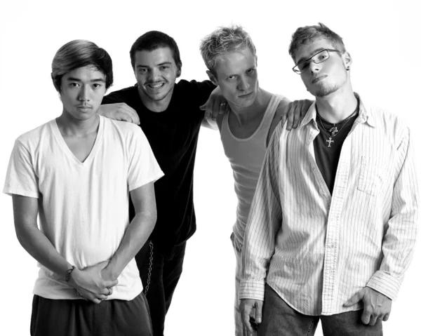 stock image Small group of young men. Studio shot over white.