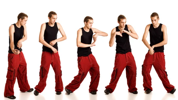 Junger Mann tanzt. Bewegungsreihe. Studioaufnahme über Weiß. — Stockfoto