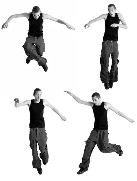 Jonge man springen. zwart en wit collectie. studio opname over Wit. — Stockfoto