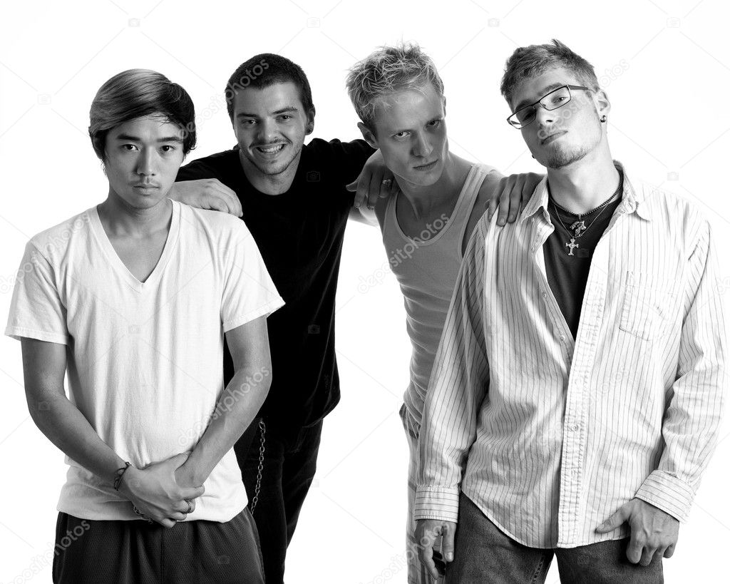 Small group of young men. Studio shot over white.