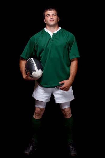 Mannelijke rugbyspeler. studio opname over zwart. — Stockfoto