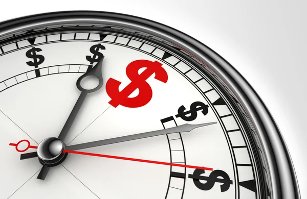 Rode dollarteken op concept klok — Stockfoto