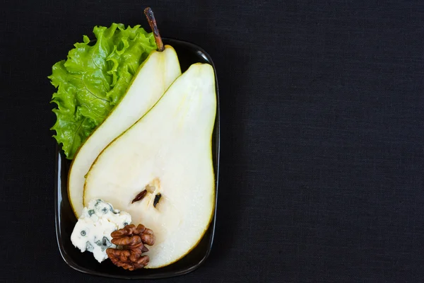 Pear with blue cheese. — Stock Photo, Image
