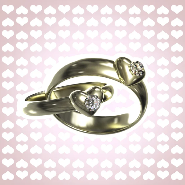 Två gyllene ringar med hjärtan och diamanter — Stockfoto