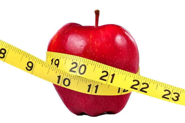 Mărul roșu și banda de măsurare — Fotografie, imagine de stoc