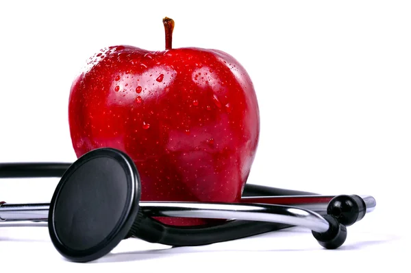 Apple och stetoskop — Stockfoto