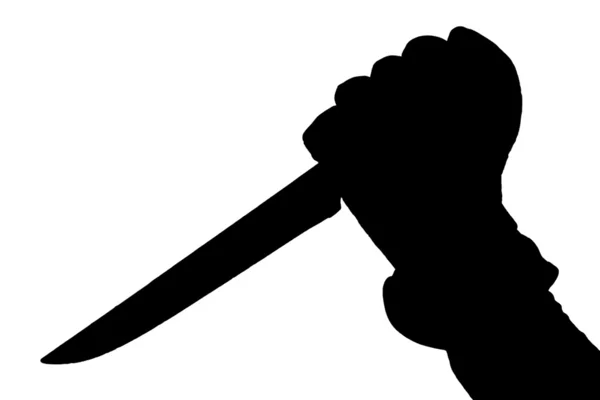 Sylwetka ręki trzymającej nóż — Zdjęcie stockowe