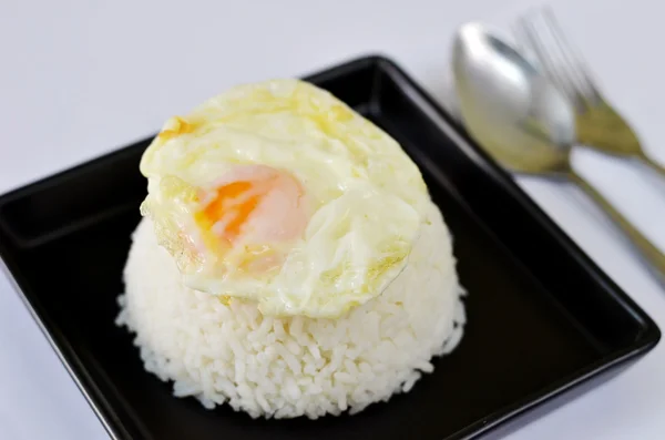 Rice and fried egg — Stock Photo, Image
