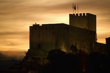 Old medieval castle in San Vicente de la Barquera clipart