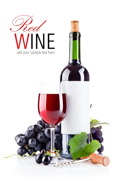 Červené víno ve skle s hrozny — Stock fotografie