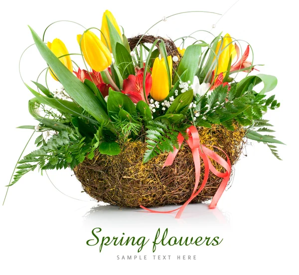 Basket of yellow tulip flowers — Stock Photo, Image